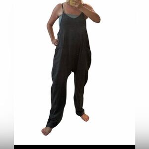 New! Romper with stretch, pockets and style! Large